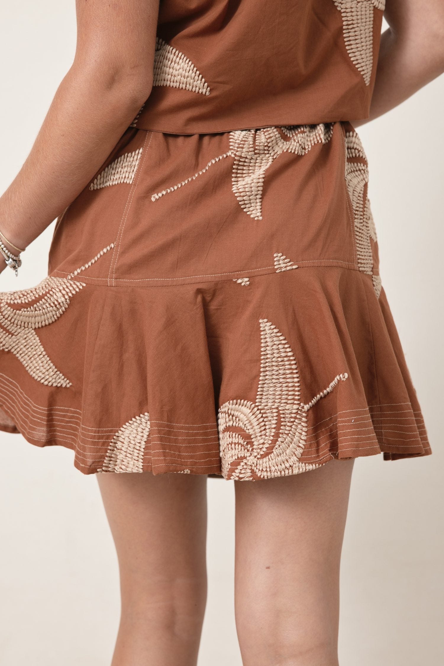 The Sayla Topstitched Belted Mini Skirt