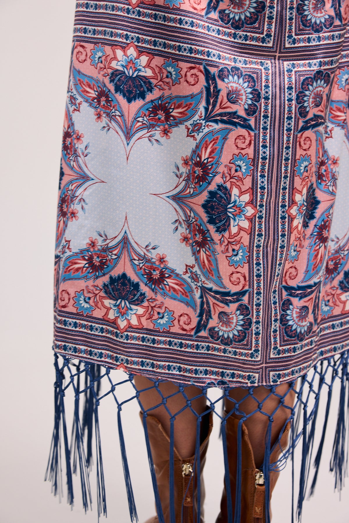 The Aries Draped Fringe Hem Midi Skirt