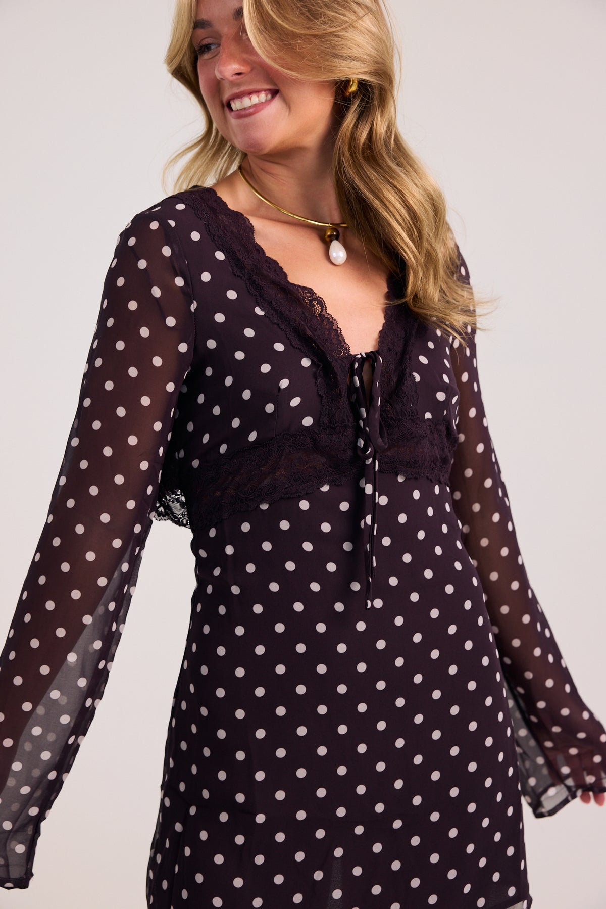 The Lucky in Love Long Sleeve Polka Dot Mini Dress